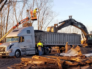 December 2019 - View looking West: Concrete loaded into trucks for transporting offsite.