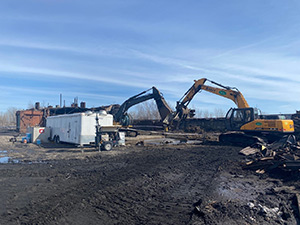 March 2021 - Transferring cleaned debris from work area to stockpile