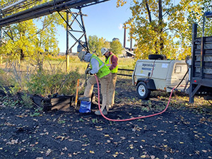 October 2020 - Hand clearing using an air knife prior to drilling at Site 109