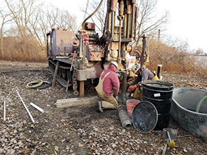November 2020 - Installing the protective casing on a monitoring well
