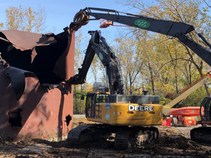 October 2019 - Site 108 - view looking northeast. Grapple can be seen holding the steel in place, while the shear attachment cuts the steel. 