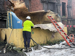 September 2021 - Supervisor inspecting cleaning of Lid Seal Tank